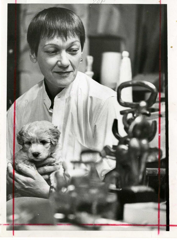 Sculptor Hannah Stewart with her cocker-poodle, Major, in 1967- Houston Chronicle